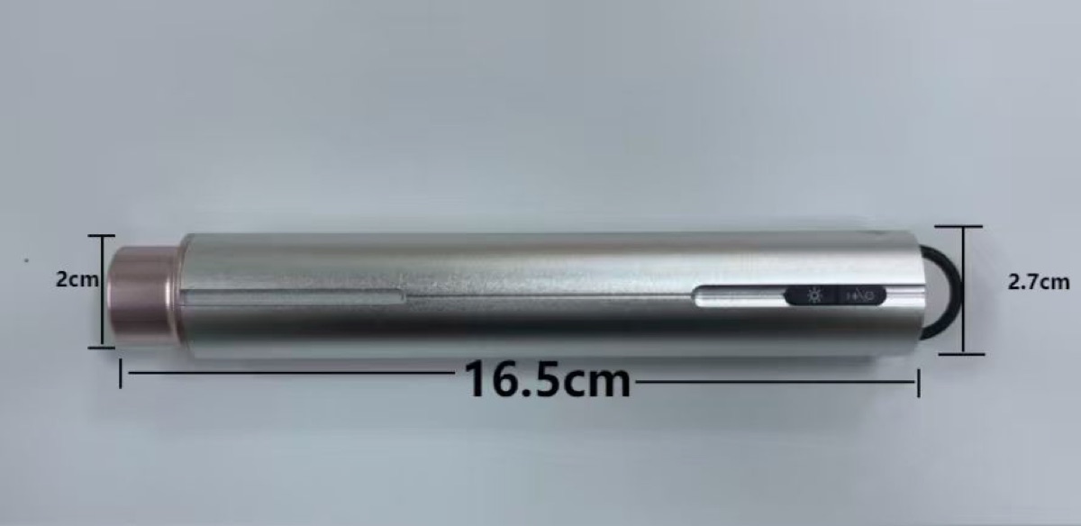 The pen photographed with its measurements: 16.5 cm long, 2.7 cm across, 2 cm at the tip